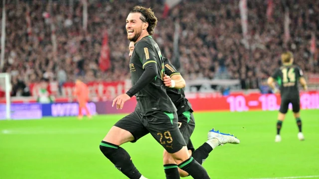 Joe Scally celebrates his equalizer for Gladbach against Stuttgart.