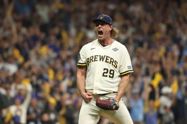 "To get that first one out of the way with a win is a big step in the right direction there," Trevor Megill said of working out of a ninth-inning jam to seal the Brewers' Game 1 win.