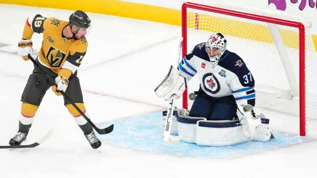 Connor Hellebuyck officially reinstated from suspension after trade to Devils