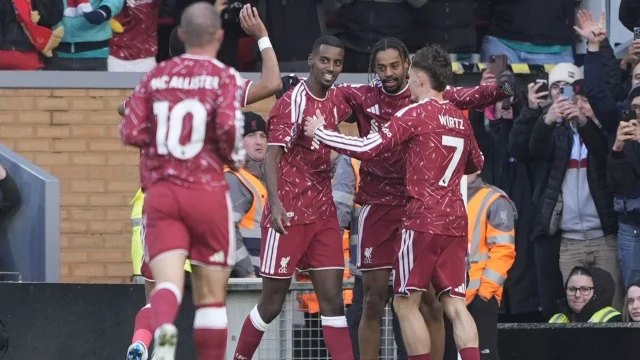Liverpool's Alexander Isak celebrates scoring their side's second goal of the game