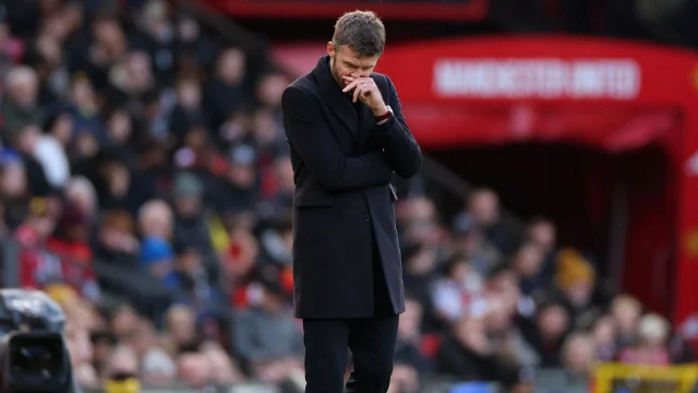 Michael Carrick, Manager of Manchester United, looks down