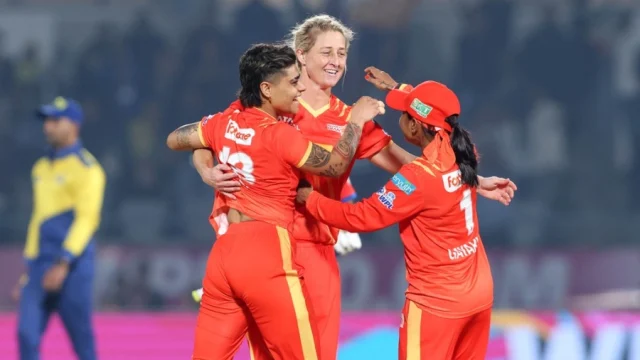 Kashvee Gautam and Rajeshwari Gayakwad hug Sophie Devine