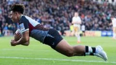 Smith stars as Quins beat Saracens for first win