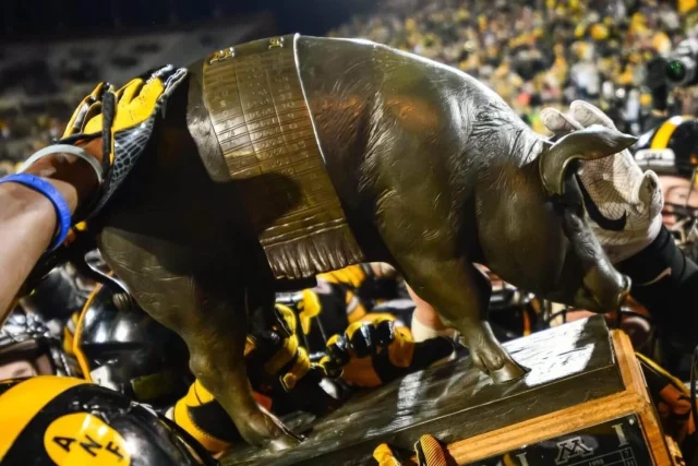 College football's top 25 rivalry trophies: Ranking the tools and tokens of heated traditions