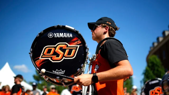 Oklahoma State announces student crackdown after fans injure marching band members