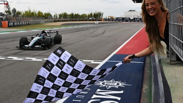 Sophie Cunningham turns heads as chequered flag waver at Formula 1’s United States GP