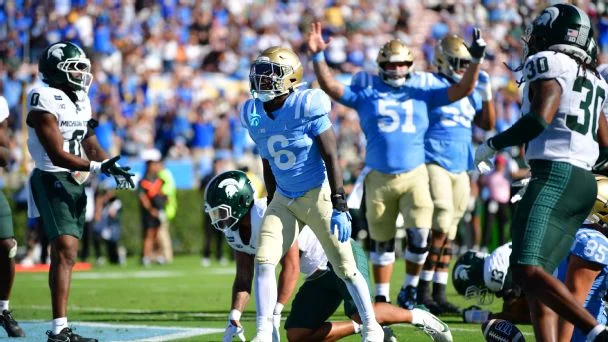UCLA running back Anthony Woods rushed for 112 yards and one touchdown against Michigan State.