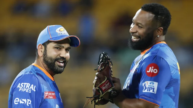 Rohit Sharma and Kieron Pollard look pleased with things before the start of the game