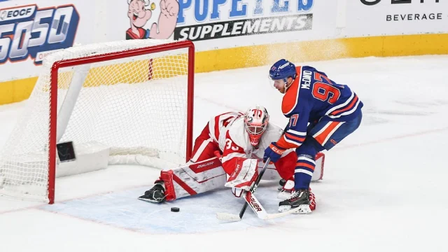 Postava wins in first career start as Wings top McDavid, Oilers in shootout